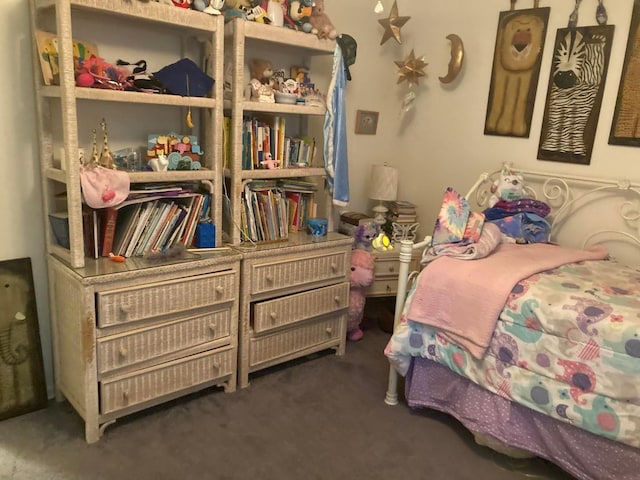 bedroom with dark carpet