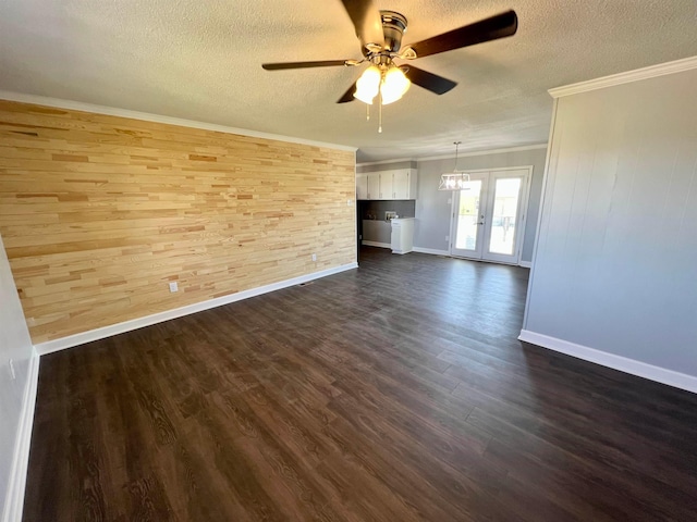 spare room with ceiling fan, french doors, and dark hardwood / wood-style flooring