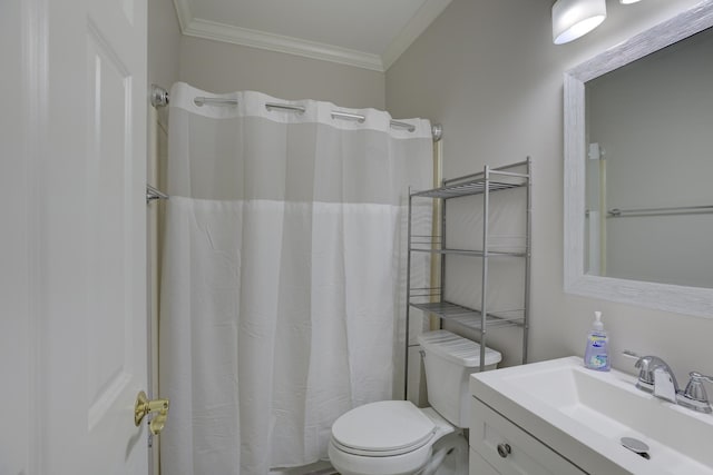 bathroom featuring ornamental molding, toilet, and vanity