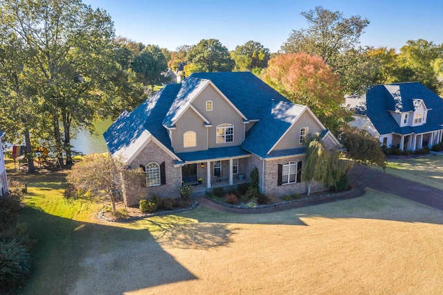 front of property featuring a front lawn