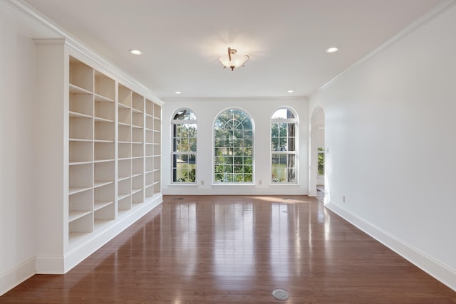 1615 Cedar Lake Cir, Hernando, MS 38632 - spare room featuring ornamental molding and dark wood-type flooring
