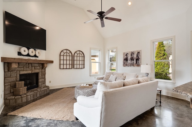 11911 Pete Dr, Collierville, TN 38017 - living room featuring ceiling fan, high vaulted ceiling, and a stone fireplace