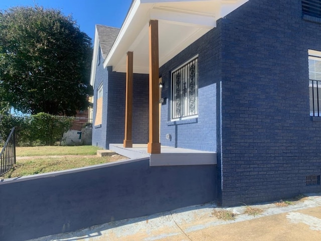 view of home's exterior featuring a lawn