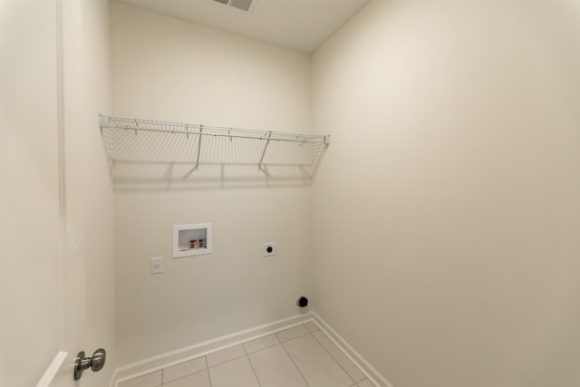 laundry room with washer hookup, light tile patterned floors, and electric dryer hookup