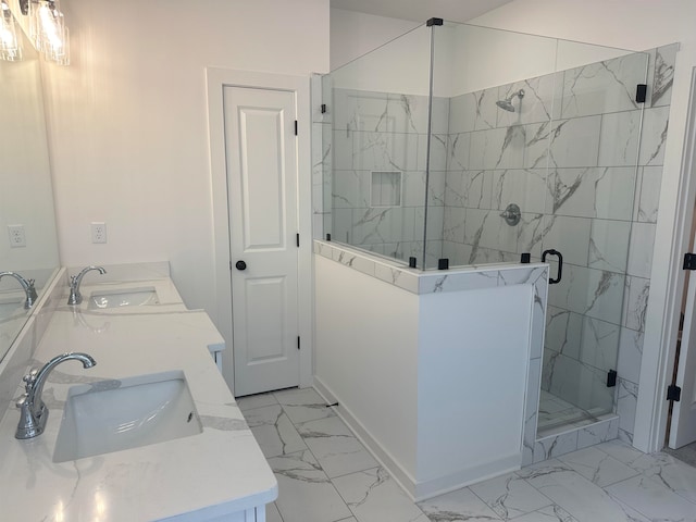 bathroom with vanity and an enclosed shower