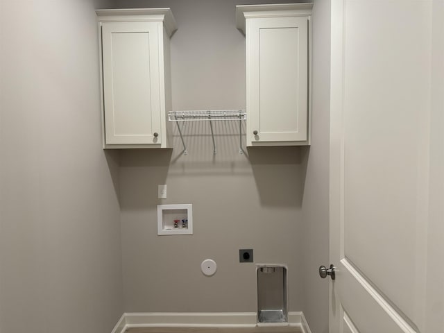 laundry room with hookup for a gas dryer, hookup for a washing machine, cabinets, and hookup for an electric dryer