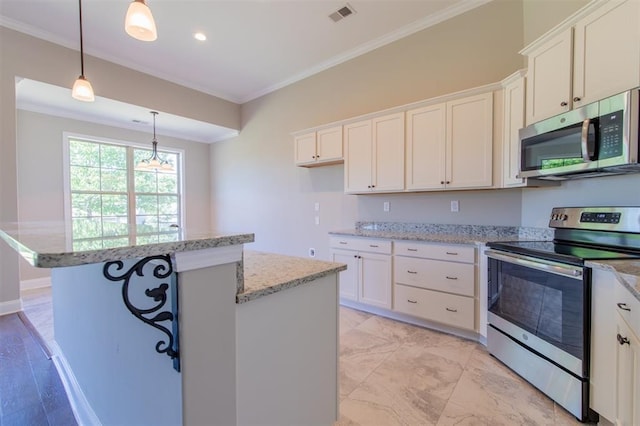 kitchen featuring white cabinets, a kitchen island, stainless steel appliances, light stone countertops, and hanging light fixtures