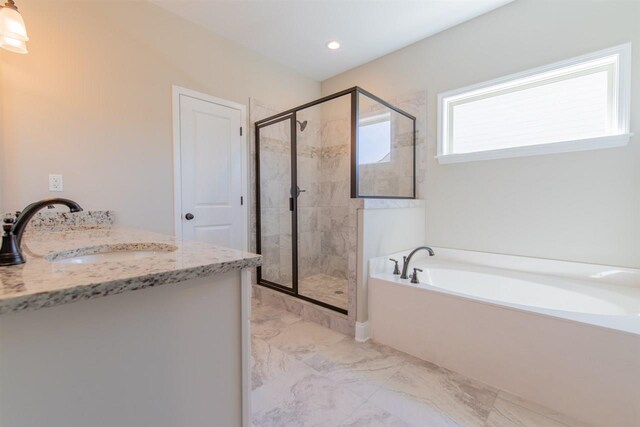 bathroom with vanity, plus walk in shower, and tile flooring