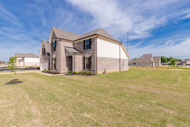 view of property exterior featuring a lawn and a garage