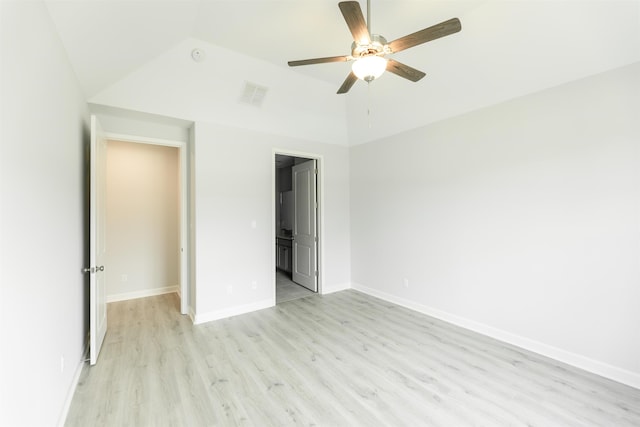 unfurnished bedroom featuring lofted ceiling, light hardwood / wood-style flooring, and ceiling fan