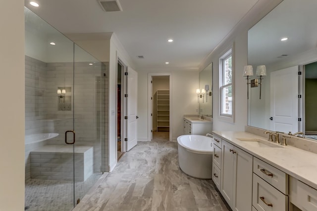 bathroom featuring tile flooring, plus walk in shower, and oversized vanity