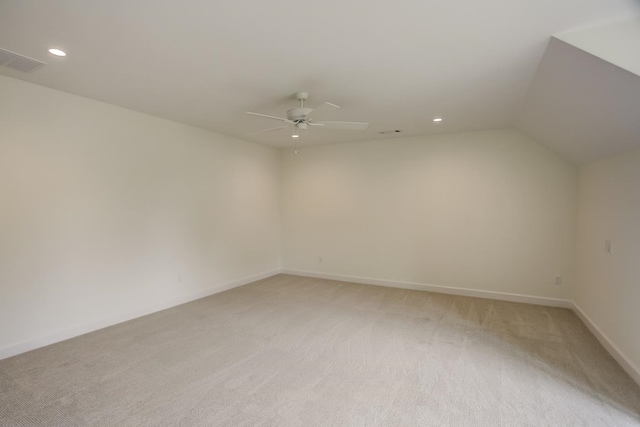 bonus room with light colored carpet, ceiling fan, and lofted ceiling