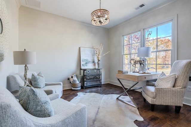 office featuring a chandelier, dark wood-type flooring, and ornamental molding