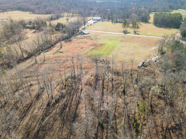 birds eye view of property featuring a rural view