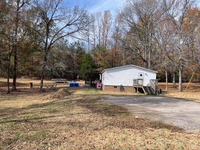 view of yard featuring a carport