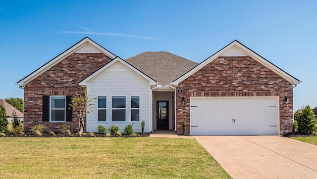 view of front facade featuring a front lawn and a garage