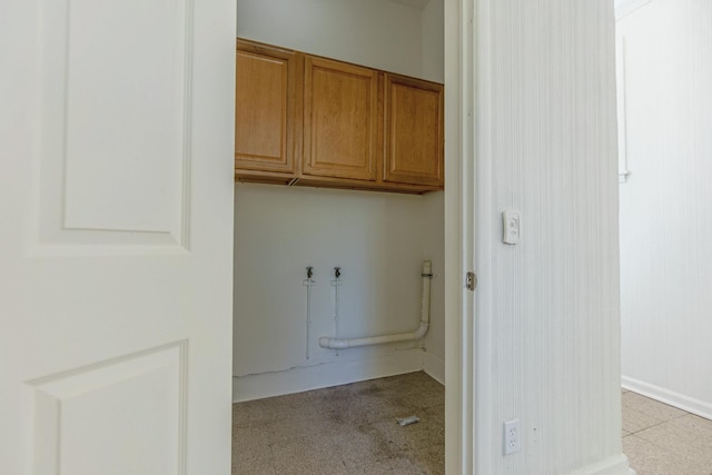 washroom with cabinet space