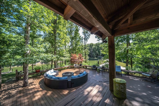 wooden deck featuring a fire pit