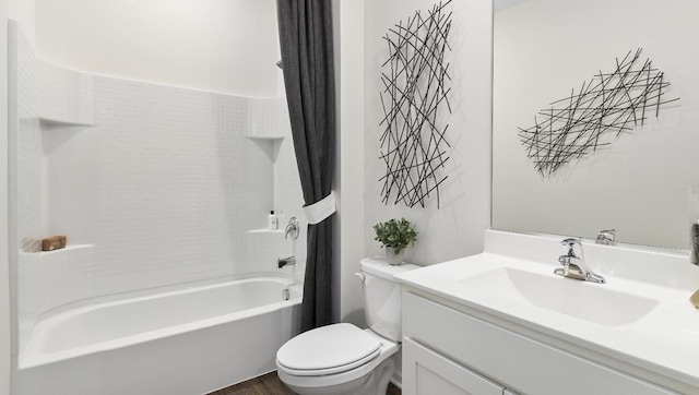 full bathroom featuring shower / tub combo with curtain, vanity, wood-type flooring, and toilet