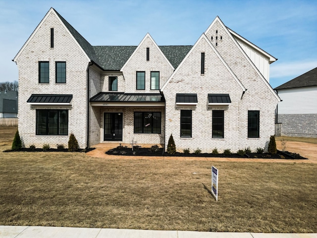 view of front of home with a front yard