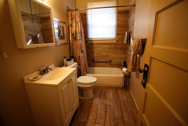 full bathroom featuring shower / tub combo, toilet, vanity, and hardwood / wood-style flooring