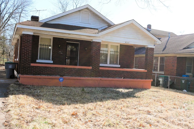 bungalow with a porch and central AC