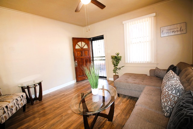 living room featuring crown molding, ceiling fan, and dark hardwood / wood-style flooring