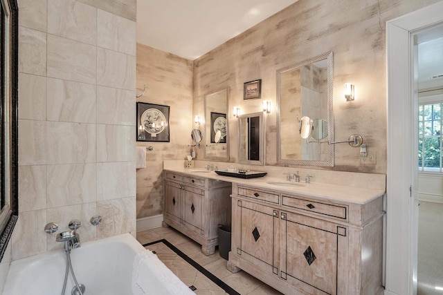 bathroom with tile walls, a washtub, dual bowl vanity, and tile flooring