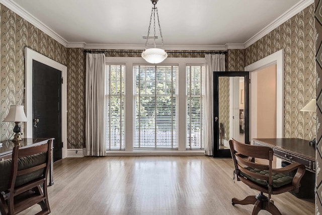 office space featuring ornamental molding and light wood-type flooring