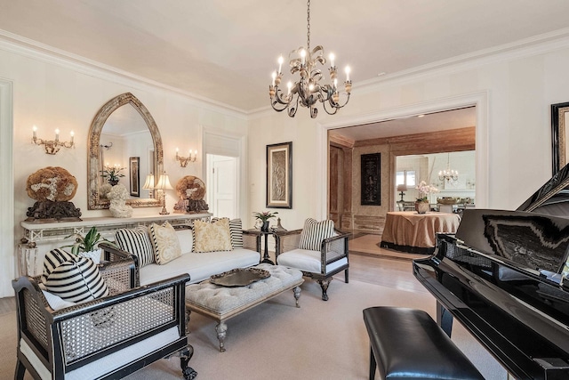 living room with a chandelier, light hardwood / wood-style floors, and crown molding