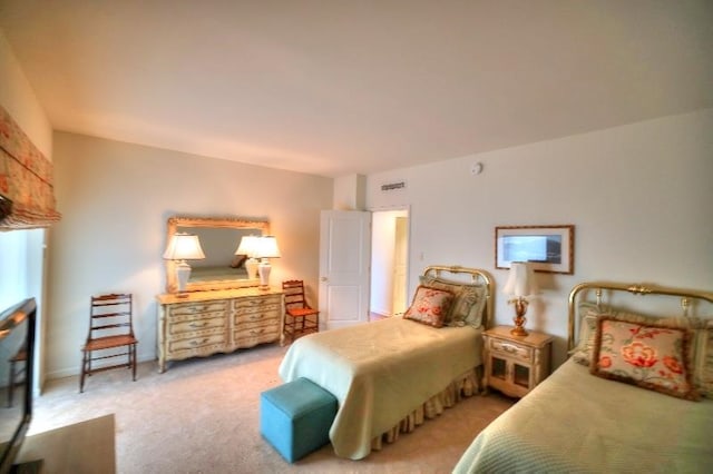 475 N Highland Ave Unit 3G, Memphis, TN 38122 - bedroom featuring light colored carpet