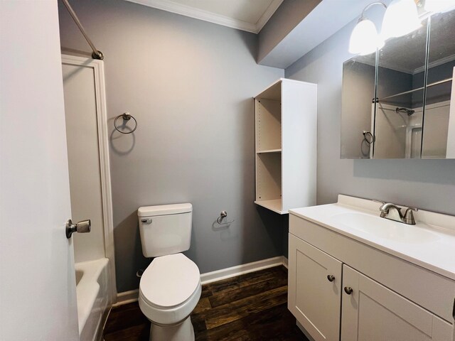 full bathroom with oversized vanity, toilet, hardwood / wood-style flooring, and crown molding