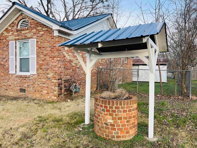 view of property exterior with a yard