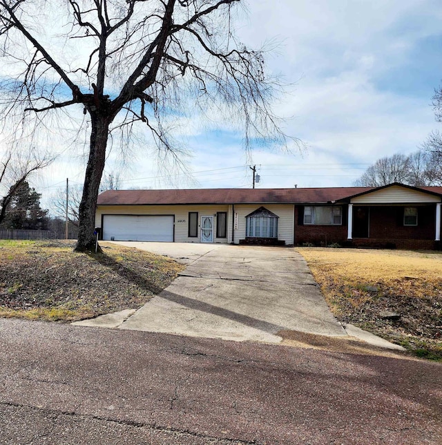 single story home with a front lawn and a garage