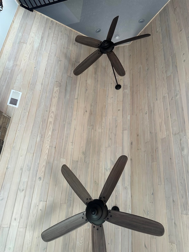 room details with ceiling fan and light wood-type flooring