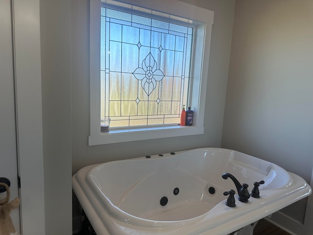 bathroom featuring a tub