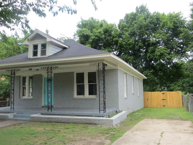 bungalow-style house featuring covered porch