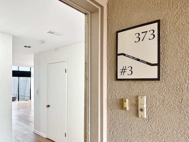 interior details with hardwood / wood-style flooring