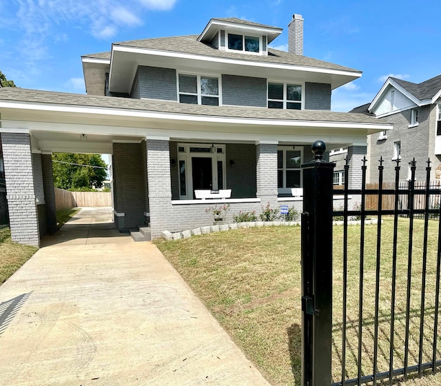 view of front of home with a porch and a front yard