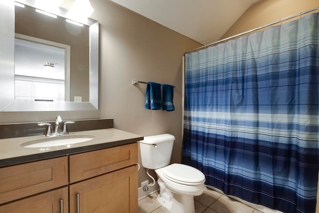 bathroom featuring vaulted ceiling, toilet, vanity, tile patterned floors, and a shower with shower curtain