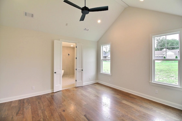 unfurnished bedroom with hardwood / wood-style flooring, high vaulted ceiling, and ceiling fan