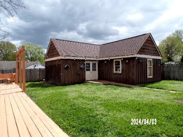 exterior space featuring a storage unit