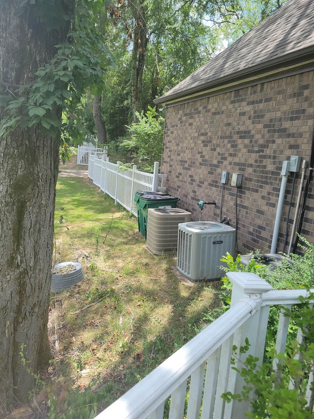 view of yard with central AC unit