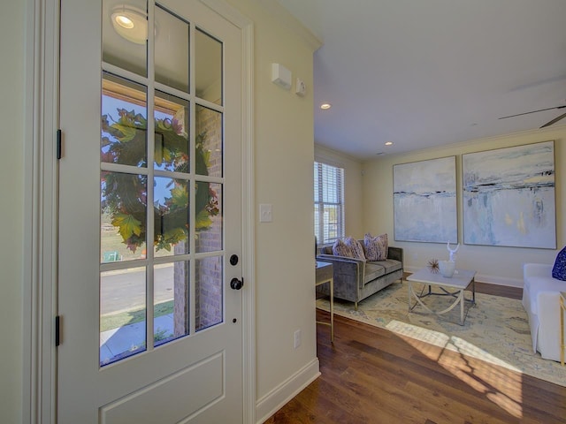 doorway with hardwood / wood-style flooring