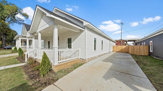 view of home's exterior featuring a porch