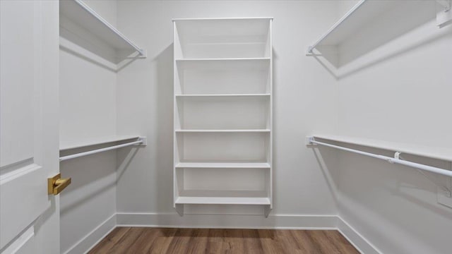 1072 Bruce St, Memphis, TN 38104 - spacious closet featuring dark wood-type flooring