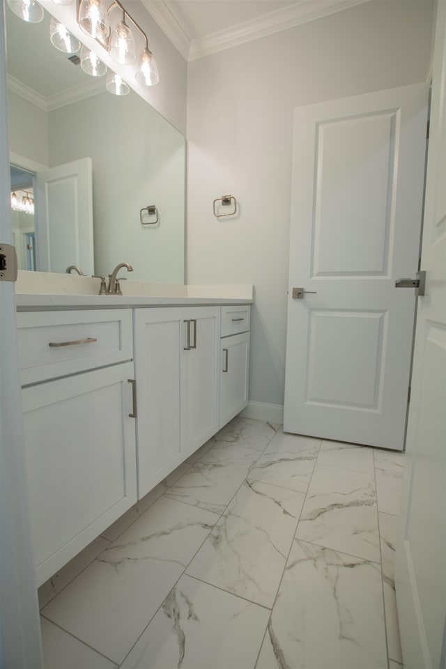 bathroom featuring tile patterned flooring, vanity, and ornamental molding