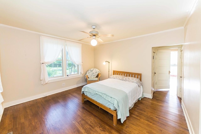 bedroom with ceiling fan, dark wood-type flooring, and crown molding