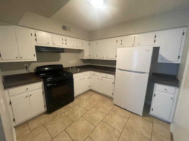 kitchen with black range with gas cooktop, white cabinets, light tile flooring, white refrigerator, and sink