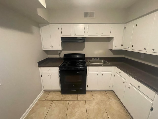 kitchen featuring black gas range oven, white cabinets, sink, light tile flooring, and extractor fan